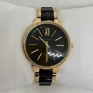 Ann Klein women watch 37mm round gold black tone Ak1412 quartz size 6.5” running